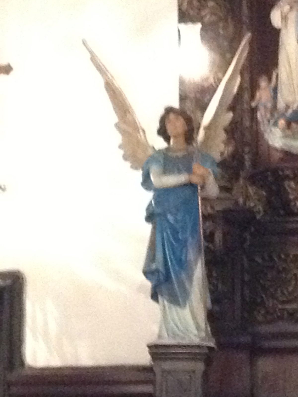 A statue in one of the non-churches.  Reminded me of the angel in our Nativity set in color and...
